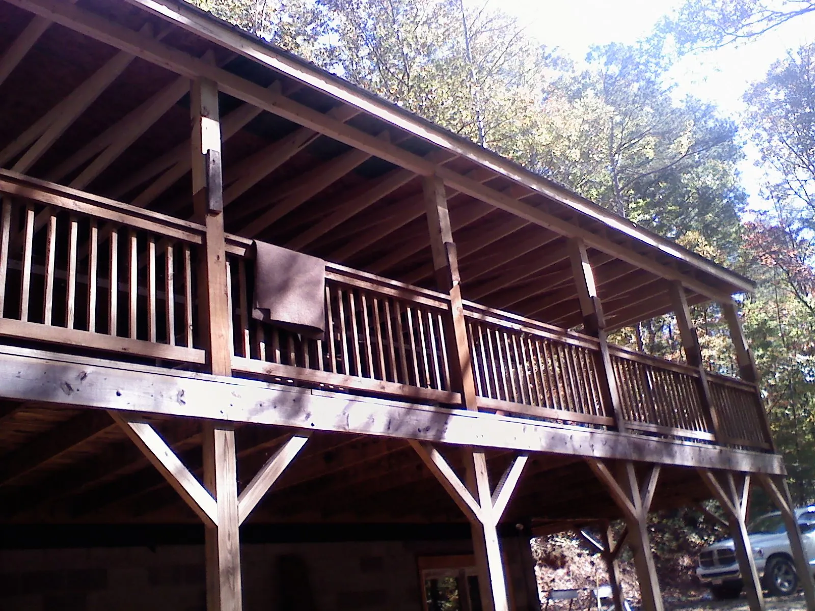 Timber framing under a new elevated porch and deck — Roof Leak Repair in Palos Hills by Roofing Brothers
